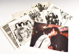 A group of signed photographs of various 1970s rock bands to include Whitesnake, After The Fire,