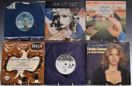 Approximately 250 singles of mixed genres