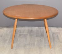 Ercol light elm circular table, diameter 75cm, H45cm