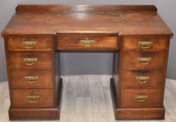 A late 19th/20thC mahogany breakfront twin pedestal desk, W122 x D56 x H73cm