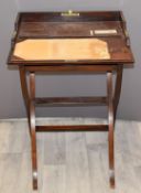 19thC mahogany folding campaign desk with tooled leather interior, W56cm