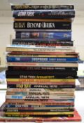 Thirty-five Star Trek related books and annuals.