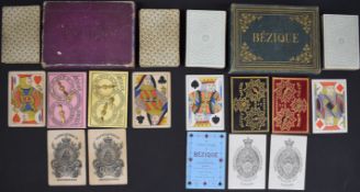 Two Bezique sets in original cases, one De La Rue with two markers, the cards with square corners