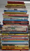 Firty-three sports related annuals and books dating from the 1950's onwards including football,