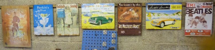 Seven metal advertising signs including Triumph TR2, Austin Healey, Beatles and HMV, approximately