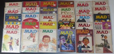Thirty-one Mad magazines comprising mainly early 1960's issues.