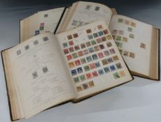 Two Imperial stamp albums and a New Ideal stamp album, sparsely filled early issues