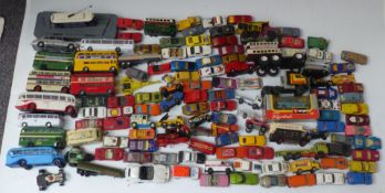 A large collection of Corgi, Dinky, Matchbox and similar diecast model vehicles including buses,
