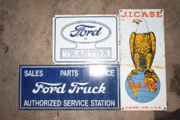 Three enamel advertising signs comprising Ford Tractor, J I Case & Ford Truck, largest 20.5 x 46cm