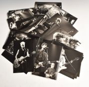 A collection of monochrome photographs to include Stray Cats rock band, mostly on stage