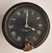 North & Sons of Watford, London vintage car dashboard clock with white hands and Roman numerals to