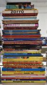 Fifty Walt Disney related books and annuals including Treasure Island, Donald Duck, Toyland,
