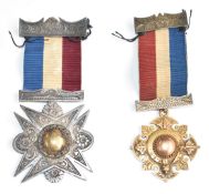 Two possibly French or continental Masonic or similar medals or orders, one marked sterling silver