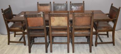 An oak peg jointed refectory table and eight (2+6) leather upholstered oak dining chairs, W223 x D78