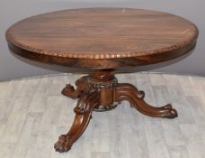 Victorian circular rosewood breakfast table with Dentil edge, raised on pad feet, diameter 126,