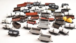 Fifty Graham Farish, Lima or similar N gauge model railway goods wagons, brake vans, tankers etc