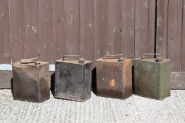 Four vintage two gallon petrol cans including Shell PLEASE NOTE this lot is located at and will be