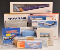 Eighteen 1:100 1:200 and 1:400 scale diecast and plastic model aircraft, all budget carrier liveries