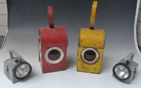 Two BR four colour railway handlamps together with two vintage Bat road lamps