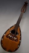 Unlabelled Fratelli Bros De Falco mandolin with fluted back and marquetry inlay made by Sebastiano