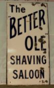 Vintage enamel advertising sign 'The Better Ole Shaving Saloon', 122 x 61cm PLEASE NOTE this lot