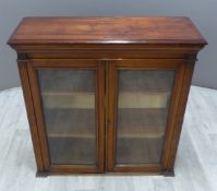 A glazed mahogany bookcase with dog's tooth shelving, W94 x D34 x H95cm