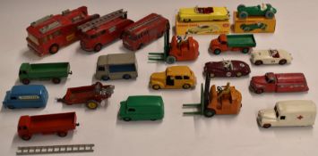 Nineteen Dinky Toys diecast model commercial and emergency vehicles including Cadillac Tourer,