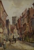 19thC watercolour street scene with church or cathedral beyond, indistinctly signed lower right,