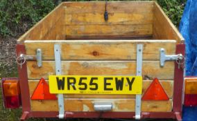 Small car trailer with wooden body sides