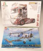 Two model kits Italeri 1:24 scale DAF XF105 Smoky Jr lorry and Tamiya 1:48 scale Fairey Swordfish