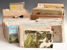 A large collection of loose all world postcards in three boxes, including topographical, humorous