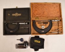 Two cased Moore & Wright micrometers, 0-4 inch and 2-3 inch and an Oxford Titan motorcycle disc
