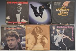 Approximately 75 singles, mostly Pop / Chart