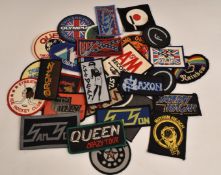 Twenty nine sew on cloth patches including Queen (2), Samson (2), Saxon, Tygers of Pan Tang (2),