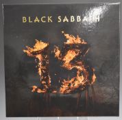Black Sabbath - Thirteen box set (602537349593) appears at least EX less slight wear on CD