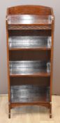 Mahogany bookcase with moulded frieze, W38 x D22 x H100cm