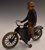 Lehmann clockwork tinplate model motorcycle and rider with blue and cream livery.