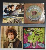 Approximately 80 albums including Dr Feelgood, Bob Dylan, Steve Earle, Dave Edmunds, Eurythmics,