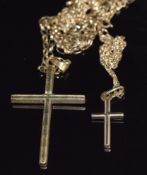Two 9ct gold chains and two 9ct gold crosses 5.4g