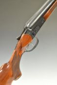 Baikal IJ-58 12 bore side by side ejector shotgun with heavy engraving of stag heads to the locks,