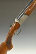 Fias 12 bore over and under ejector shotgun with engraving to the locks, underside, trigger guard,