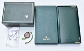 Rolex watch box with suede interior, chronometer charm, Oyster anchor charm and 2011 diary and