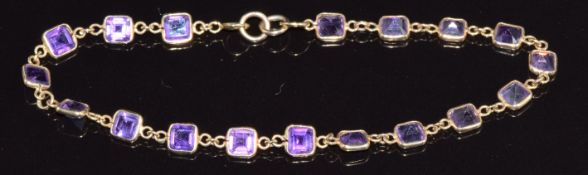 A 9ct gold bracelet set with square amethysts, 3g