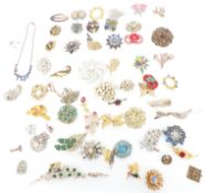 A collection of vintage brooches including, silver, Sarah Coventry, Exquisite, etc