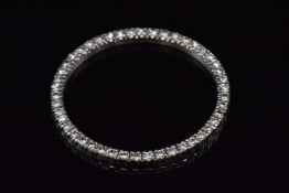 Aftermarket white metal watch bezel set with 47 diamonds, outer diameter 35.5mm, inner diameter 30.