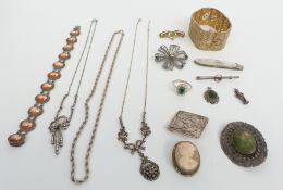 A collection of silver jewellery including brooches, cameo necklace, ring, pendant, etc