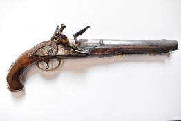Belgian flintlock holster pistol with carved decoration, engraved brass trigger guard and mounts,