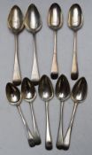 Nine Georgian Old English pattern hallmarked silver spoons, comprising a two pairs of table