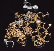 A quantity of 9ct gold earring backs, 18g