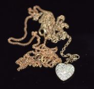 Two 9ct gold chains and a heart pendant, 2.7g